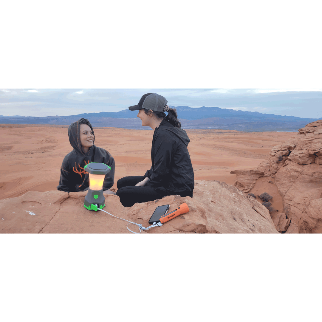 Atlas Fire Solar Camping Lantern outside at sand dunes