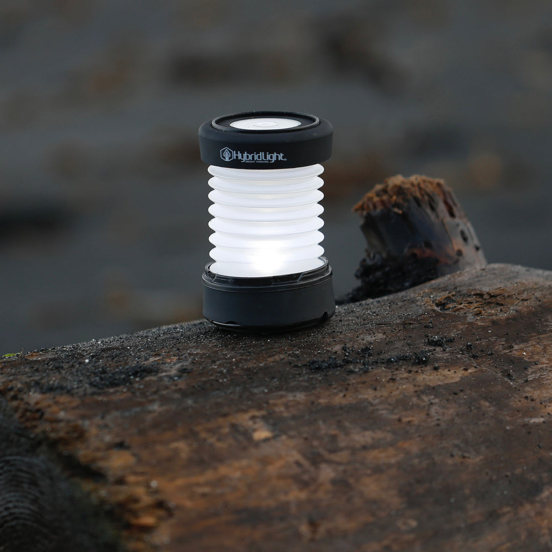 PUC 150 expandable lantern black open on log