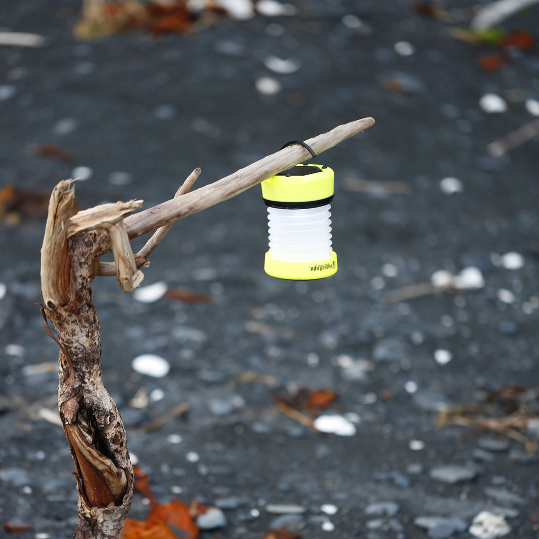 PUC 150 expandable lantern yellow hanging from hook