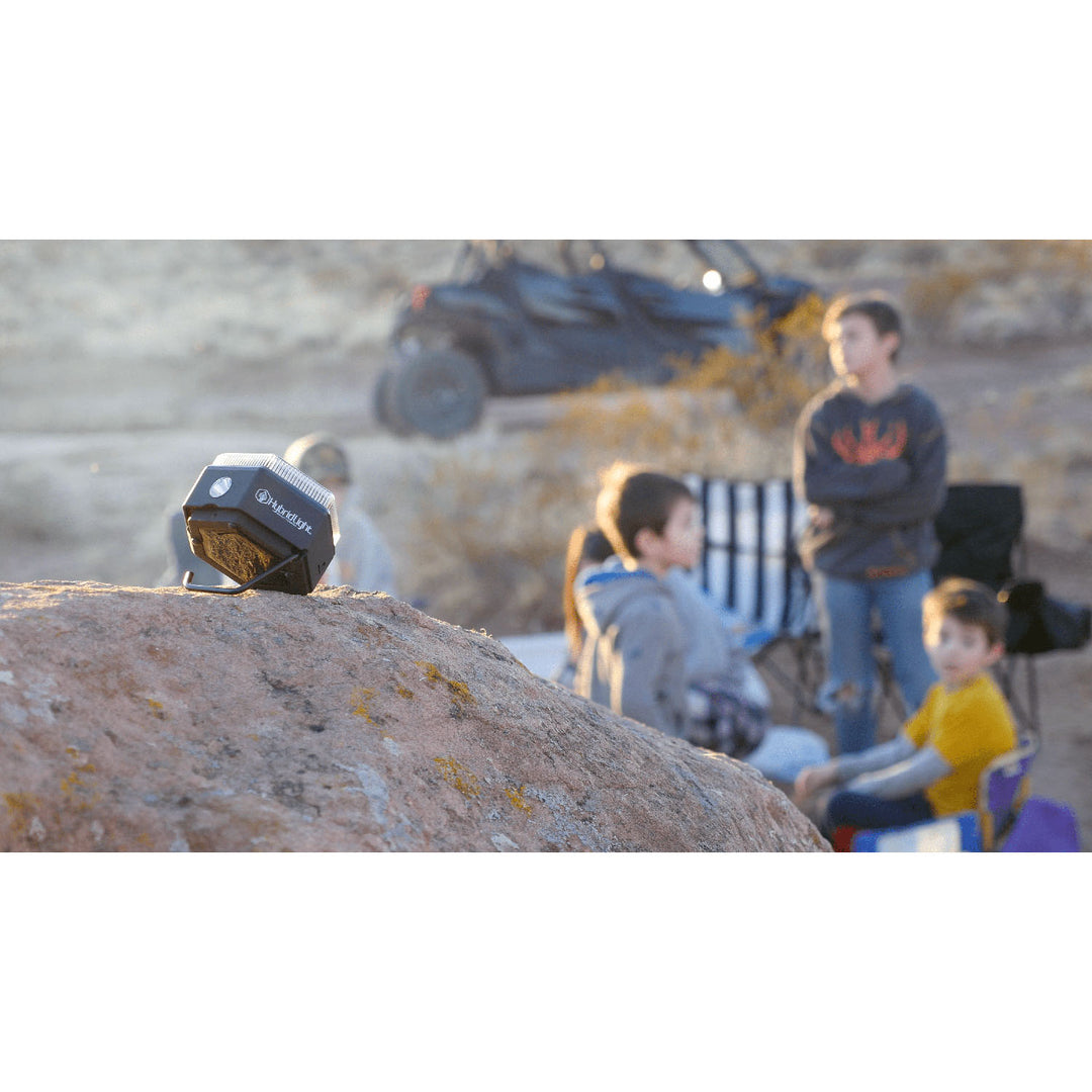 HEX Solar Speaker Charger on rock camping